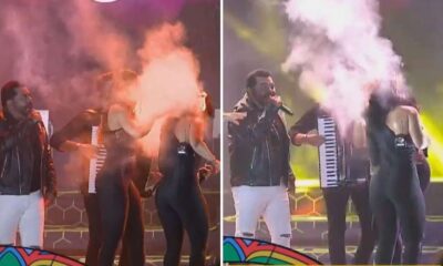 colegas ajudando cantora
