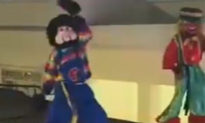 Fofão estava ao lado de outro artista, fantasiado de palhaço Patatá, em cima de um muro | Reprodução/Redes sociais