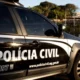 Imagem mostra carro preto da Polícia Civil.