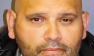 foto de rosto do homem, careca, com bigode e barba